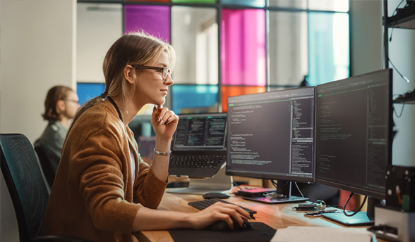 Woman working on IT coding skills and cybersecurity