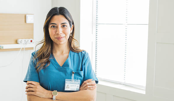 Healthcare nurse showing positivity at work