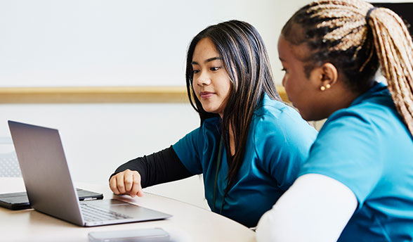Healthcare nurse showing positivity at work