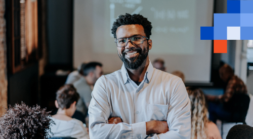 Smiling IT professional at tech conference