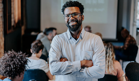 Smiling IT professional at tech conference