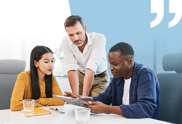 Professionals on tablet learning at work